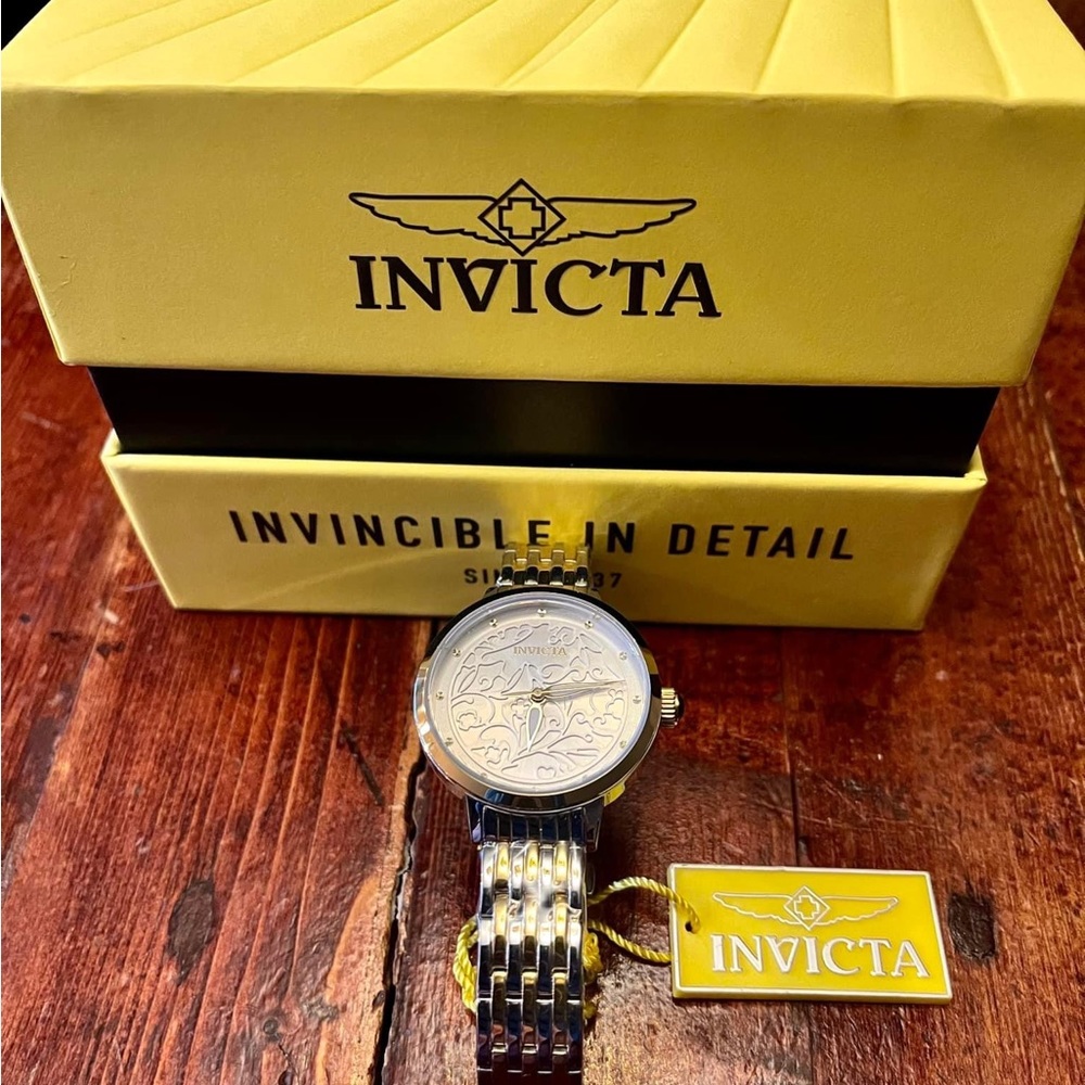 Brand new with tags 595$ price tag invicta women’s watch.